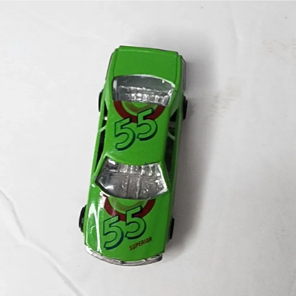 MERCEDES-BENZ 500 SEC  number 8803 can be found on inside Green Race Car #55